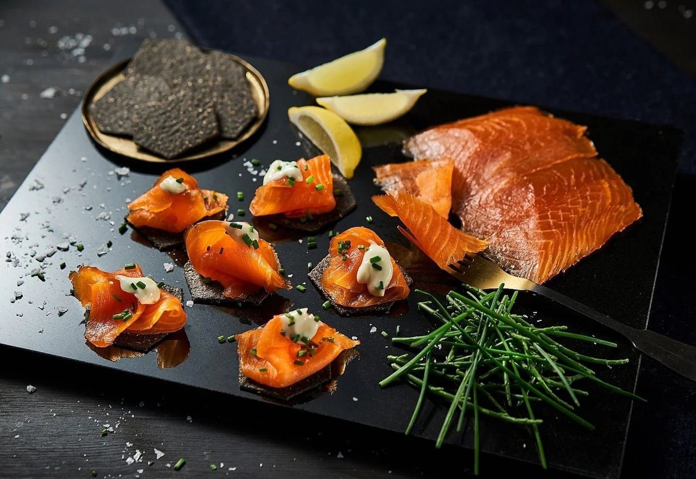 Hot-smoked salmon served on a slate platter